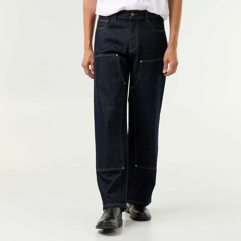 Jean baggy uni avec empiècements fantaisies